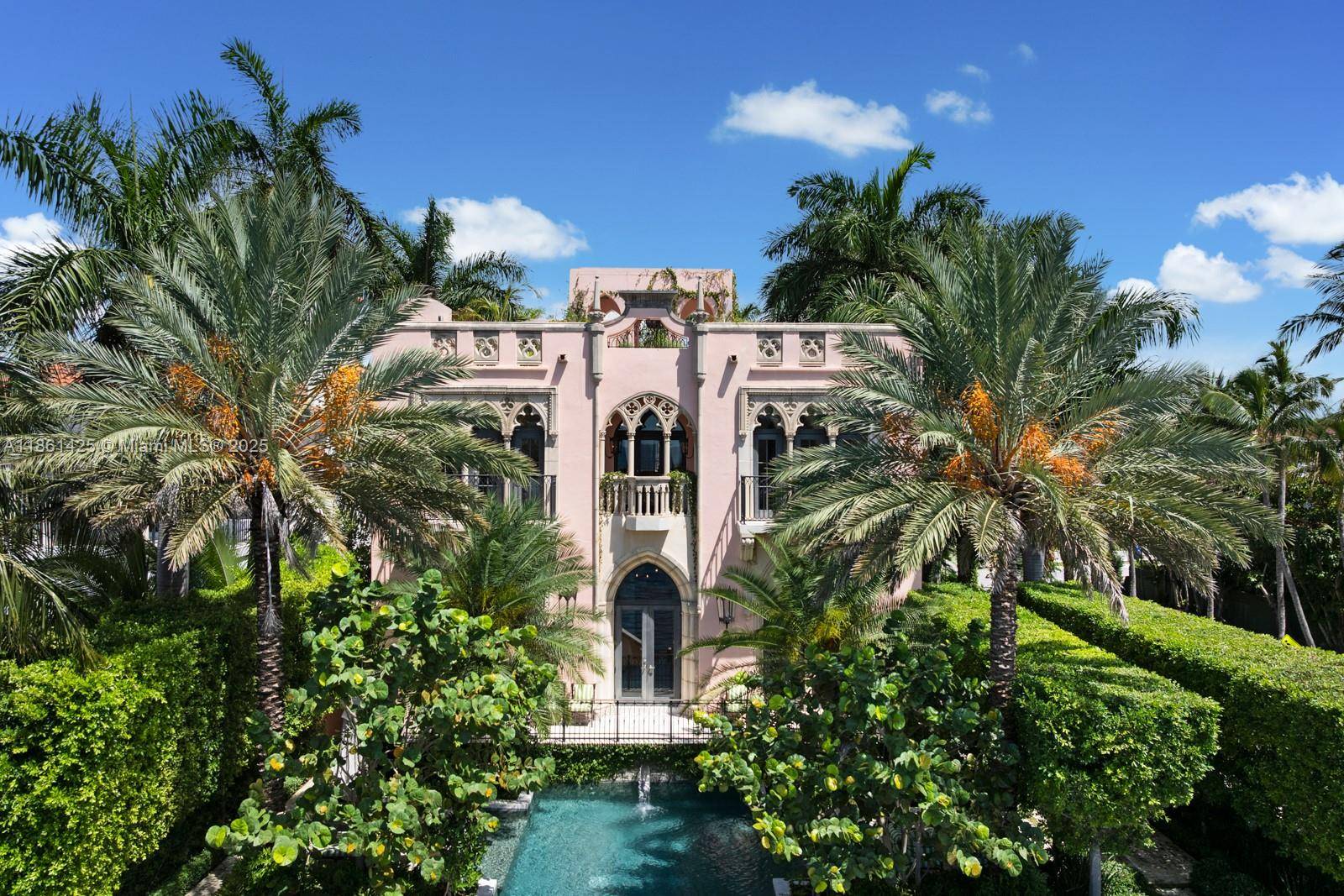 A fairytale castle in Coconut Grove, designed by Ralph Portuondo, where Gothic grandeur meets modern sophistication.
