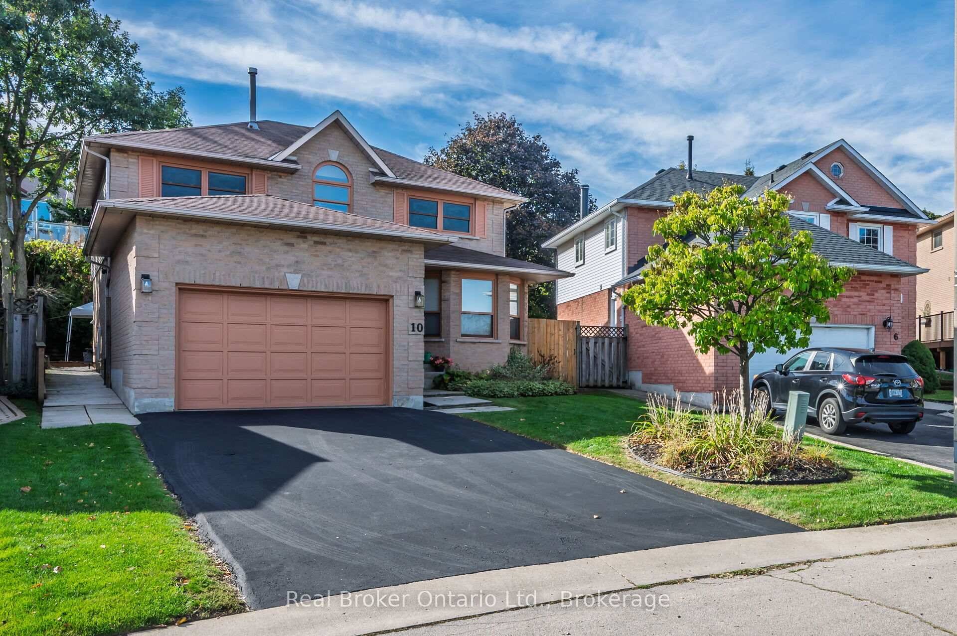 Welcome home to 10 Avonbridge Court where convenience, comfort and family living converge.
