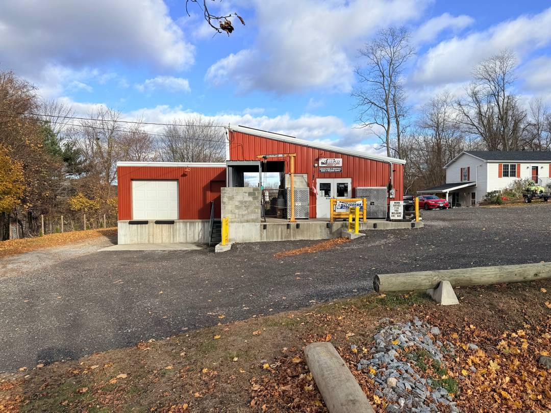 This rare mixed use property combines a thriving commercial storefront with a comfortable single family home and additional outbuildings all in one high traffic location.