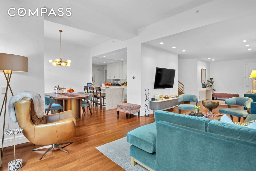 Stunning mint condition townhouse style duplex glamorously set within the amenities of a luxury condominium tower.