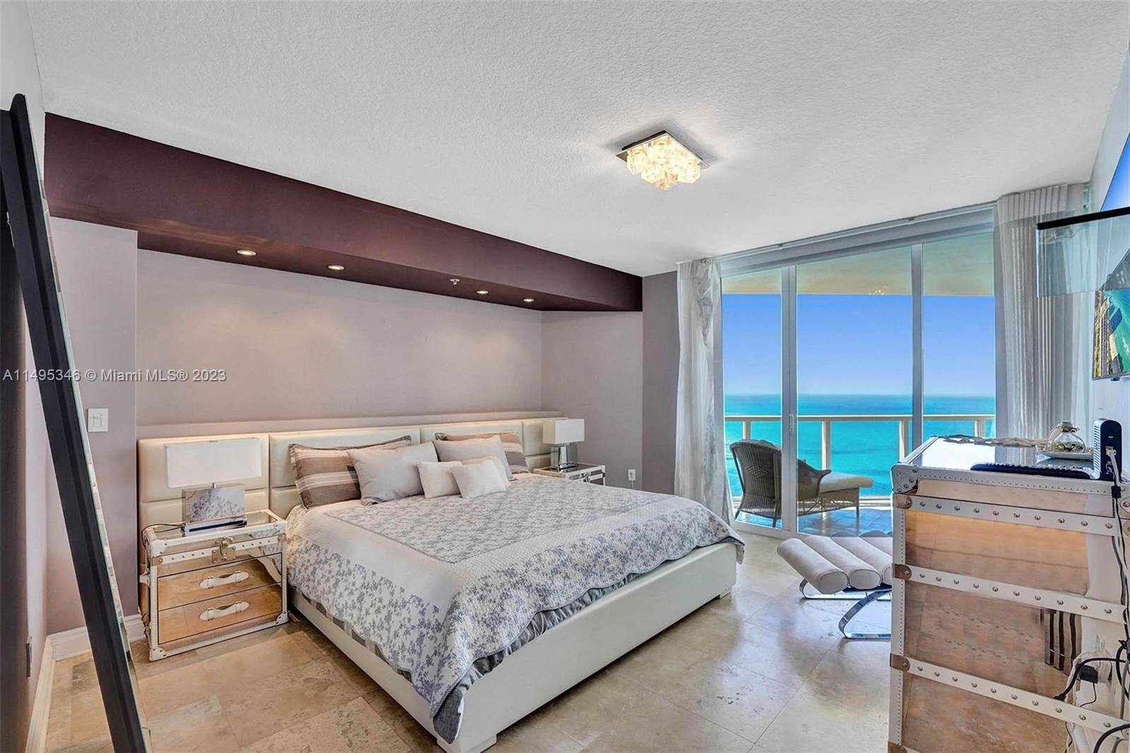LUXURIOUS DIRECT OCEAN VIEW CONDO, 2 FULL BEDROOMS PLUS DEN WHICH IS CONVERTED TO A GUEST ROOM WITH QUEEN BED AND 2.