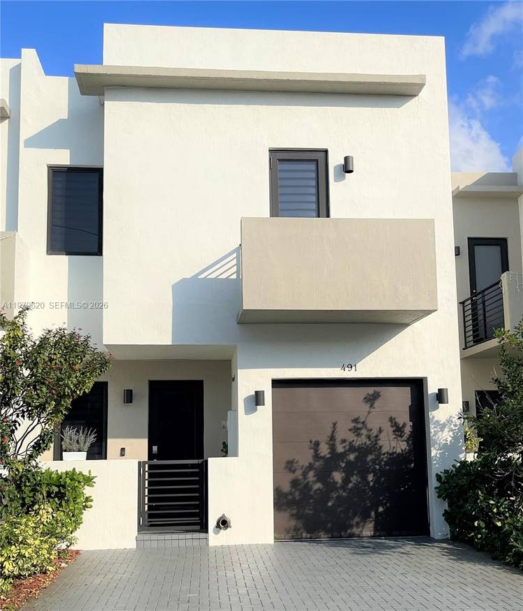Modern, Open, Carefree living, a rare 4 bedroom 3 and a half bath, located in Century Park Place.
