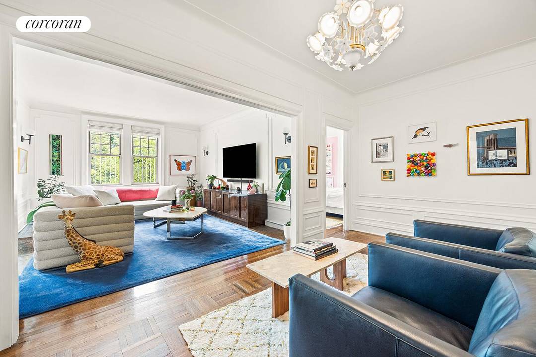 Welcome to 125 Prospect Park West a truly special home with full views of Prospect Park and a sprawling layout featuring three bedrooms, two newly renovated bathrooms, a formal living ...