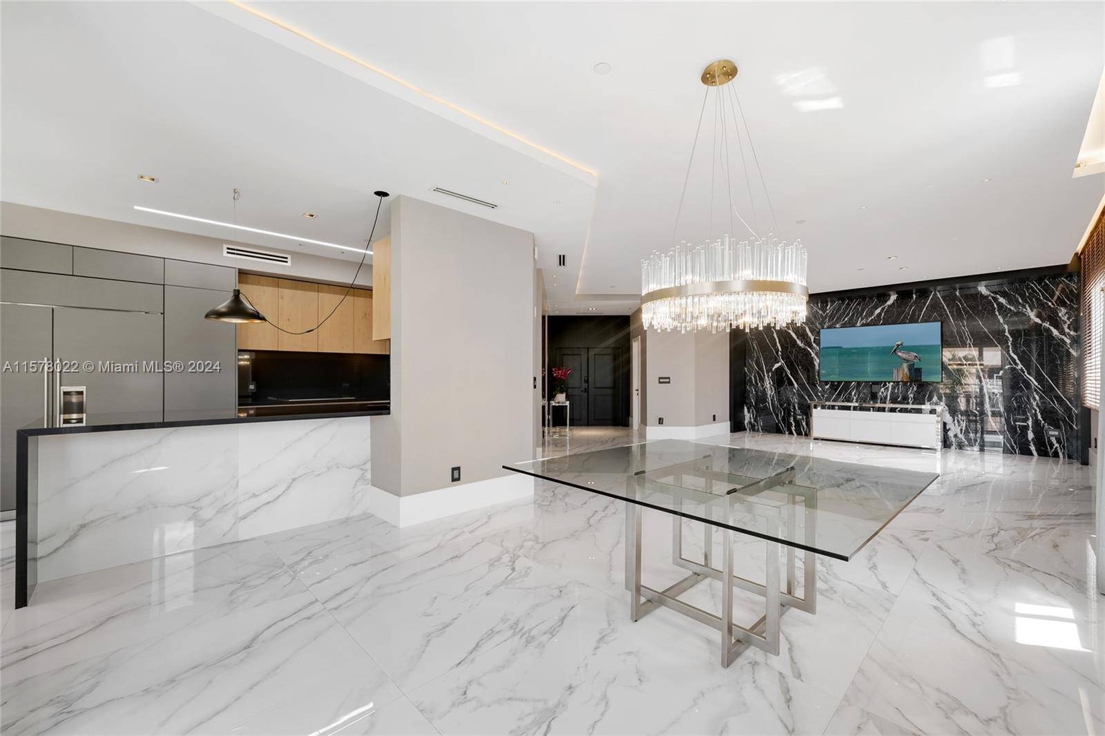 No expense spared in this newly remodeled 4BR 4BA corner unit at The Courts at South Beach South of Fifth.