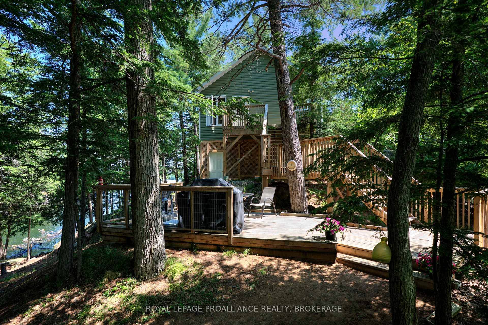 Cottage life awaits ! This beautiful island property has deep, clean waterfrontage on Bobs Lake and has easy access from the mainland with just a short 2 minute boat ride ...