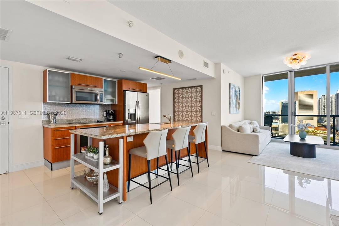 Beautiful 3 bed, 3 bath corner condo with stunning water views and 1, 486 sq ft of living space.