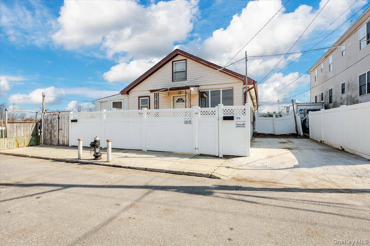 Legal 2 family with 2 separate cottages each 888 sqf nestled on 1 lot on a quiet dead end block facing the breathtaking view of the bay with private beach ...