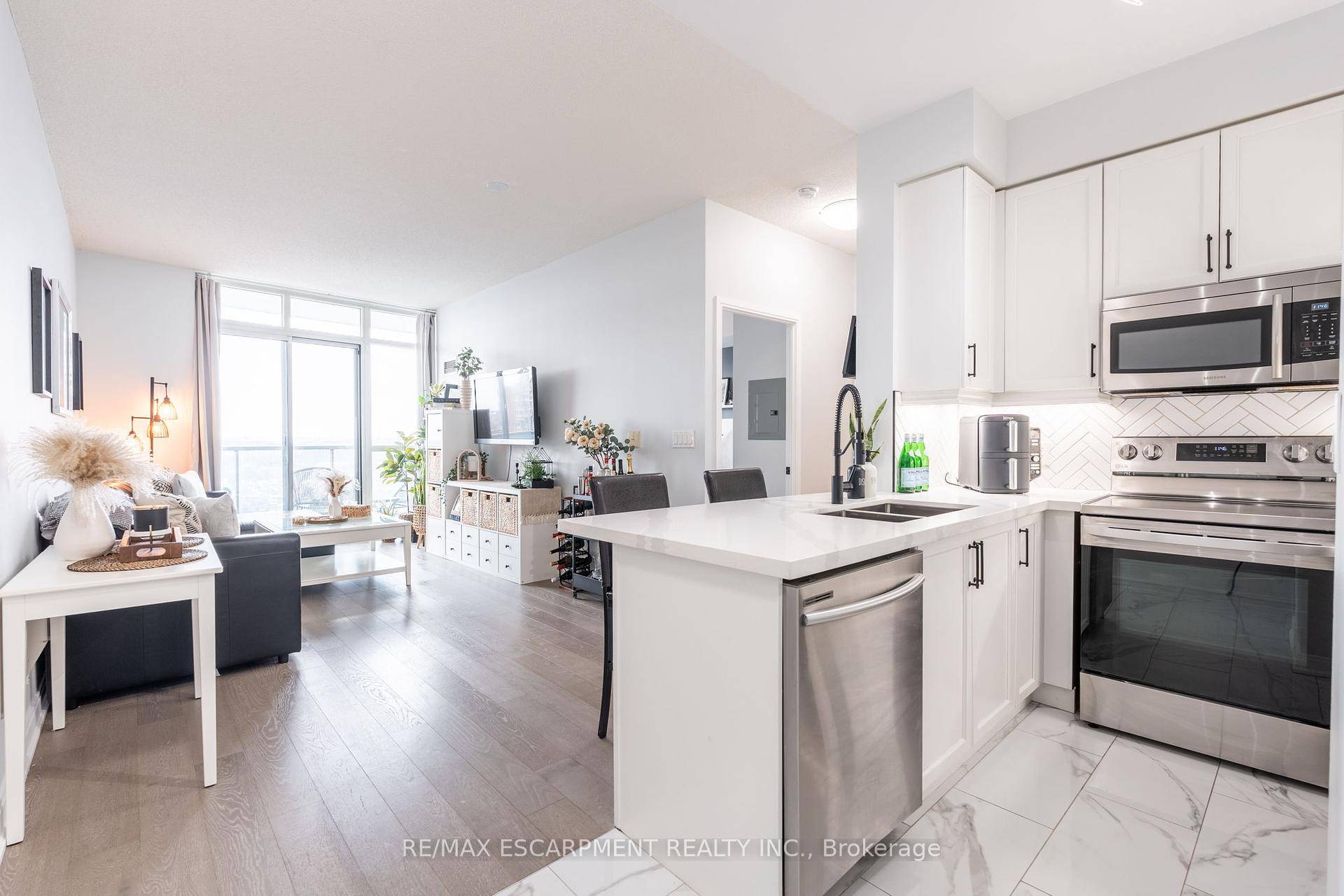 Welcome to this stunning, newly renovated 1 bedroom, 1 bath condo at 90 Absolute Avenue in the heart of Mississauga.