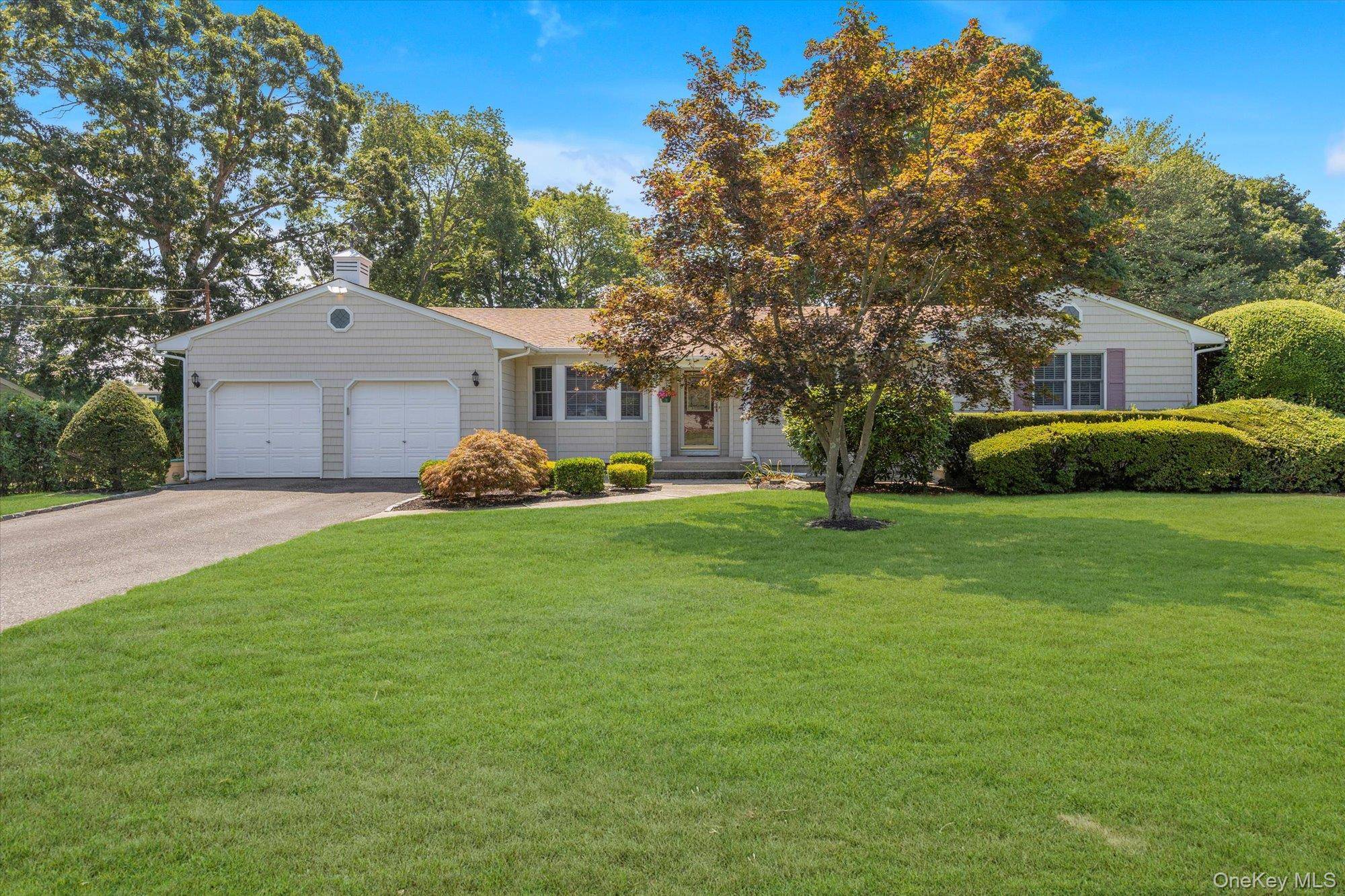 Welcome to this charming 4 Bedroom 2 full Bath Expanded Ranch, mid block location in Sayville.