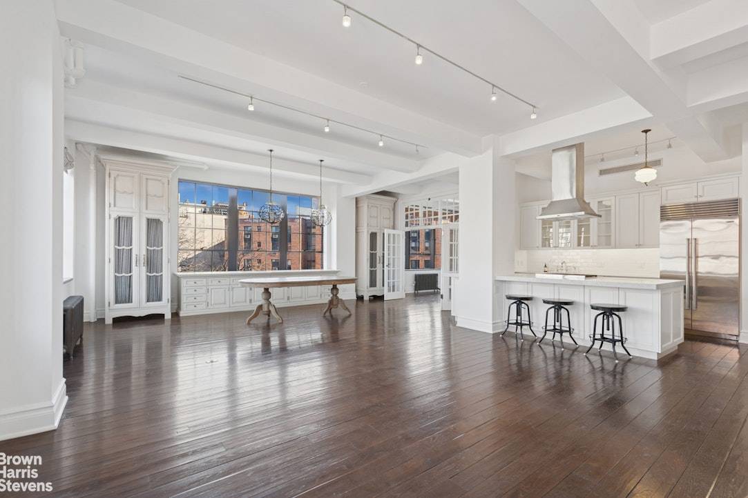 Stunning West Village Loft Style Residence 32 Morton Street 2 Bed, 2 Bath Soaring loft height ceilings and corner exposures flood this exquisite West Village home filled with natural light.