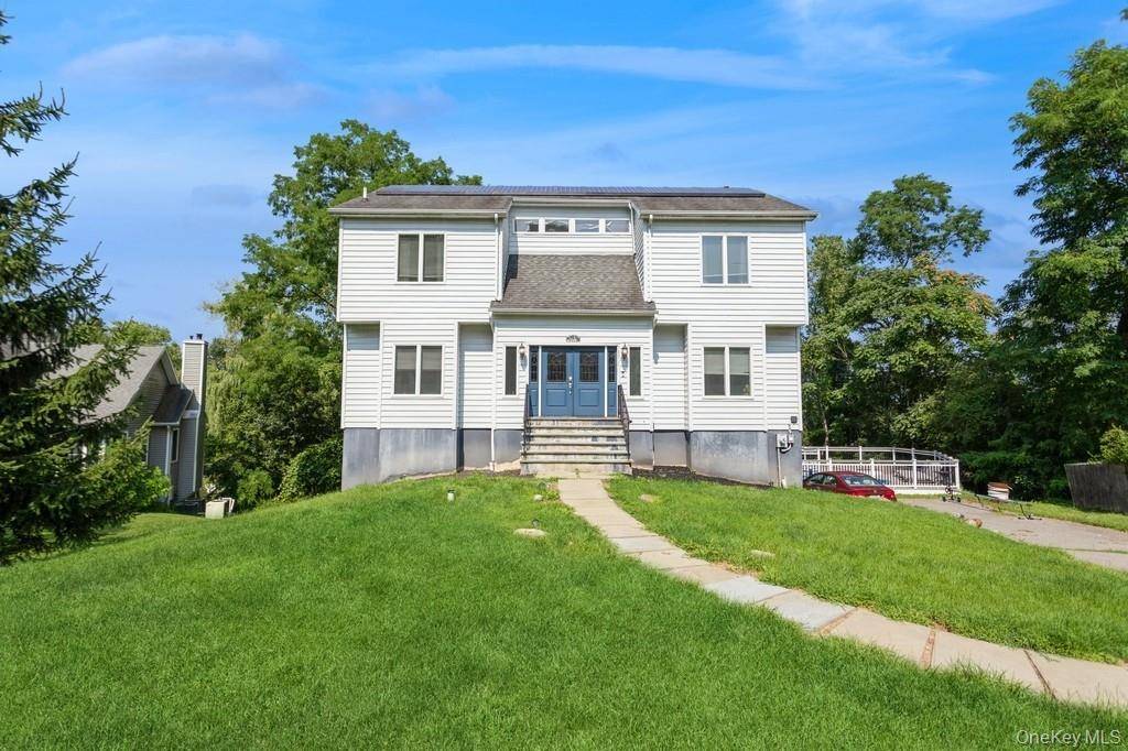 Perfectly situated on a serene, elevated lot, this 4 bedroom, 3.