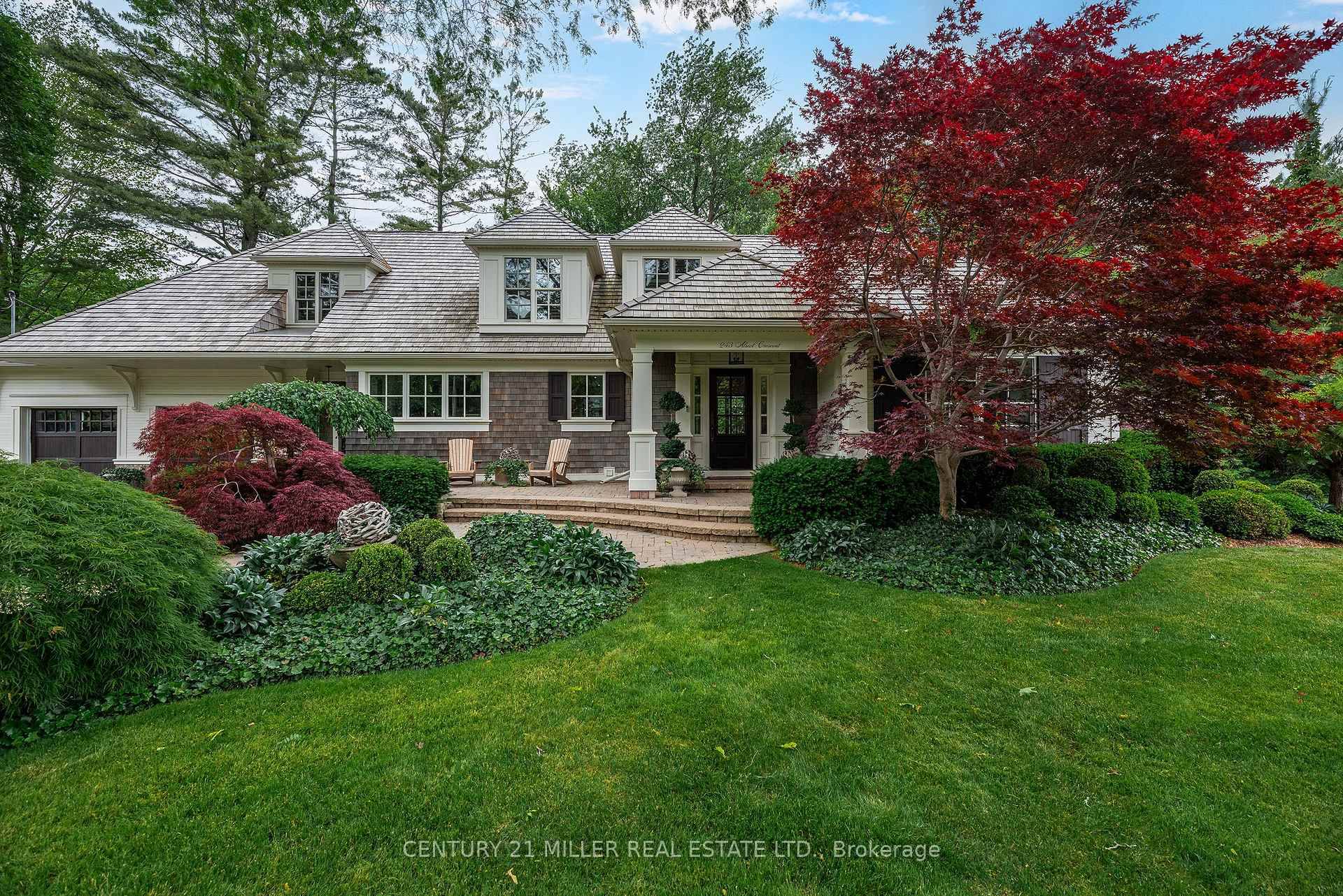 Tucked into a quiet, tree canopied crescent, 243 Alscot Crescent is defined as much by its spectacular outdoor environment as it is by its refined interior living space.