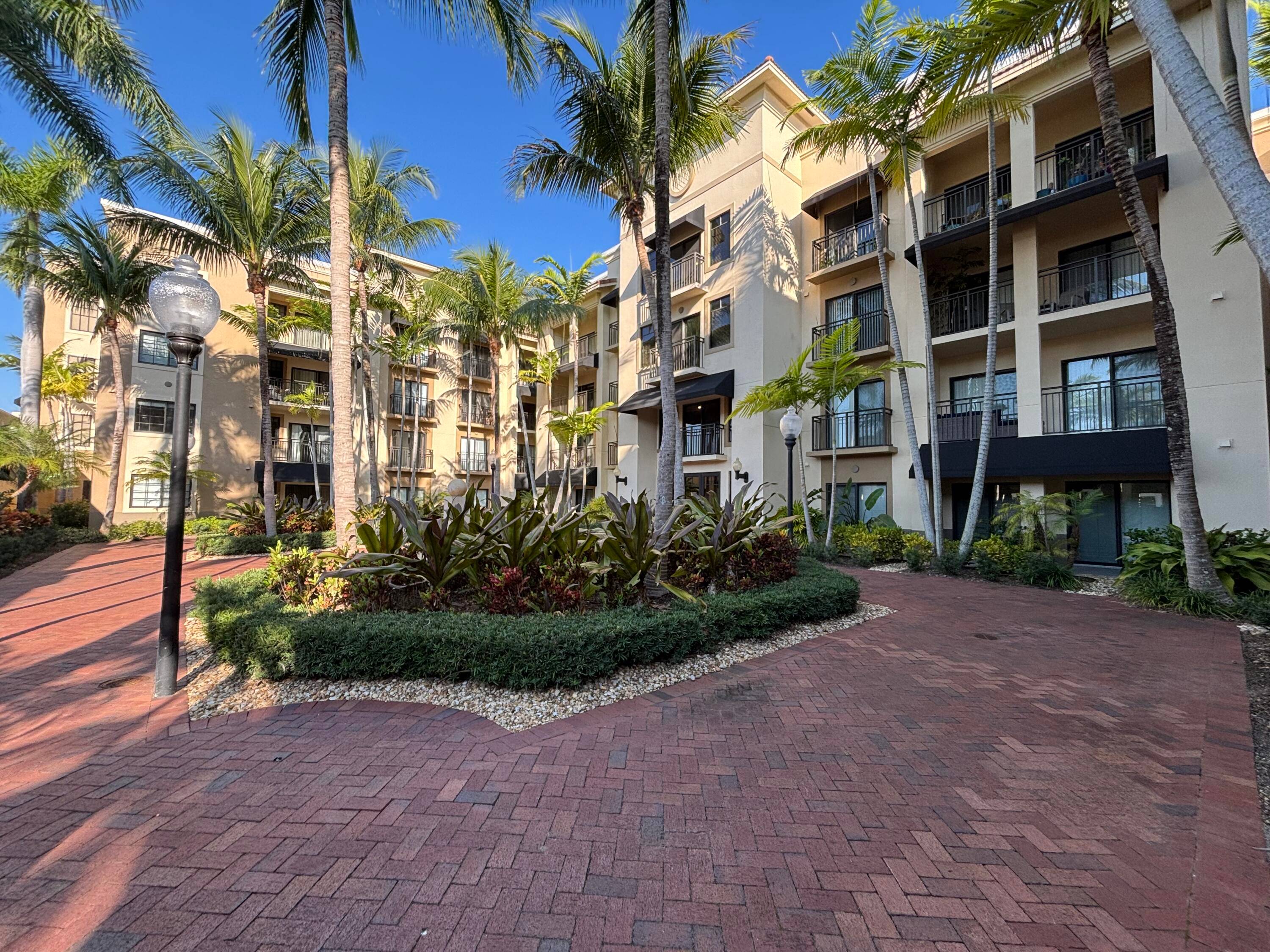Rarely available 1st floor end unit Move in Ready with brand new quartz counter tops, kitchen pantry, refrigerator, APEC UV PH water system, Light fixtures, HVAC and flooring.