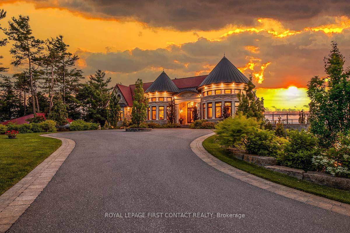Welcome to this stunning waterfront home in the Edmore Beach area of Tiny.