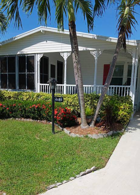 Coastal living 5 miles from the beach in a lovely home that includes a golf cart.