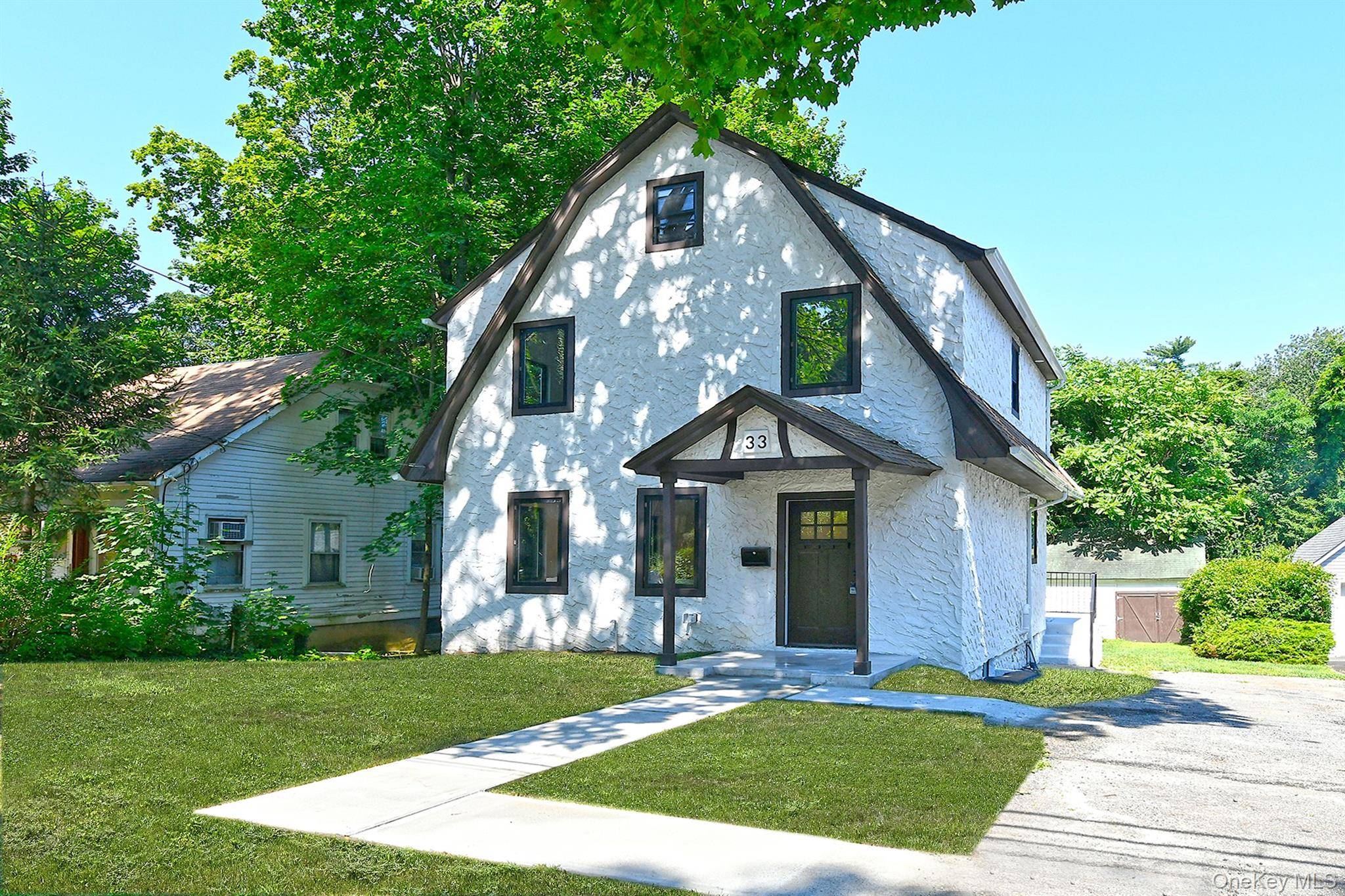 Welcome to this fully renovated Colonial in the heart of Great Neck.
