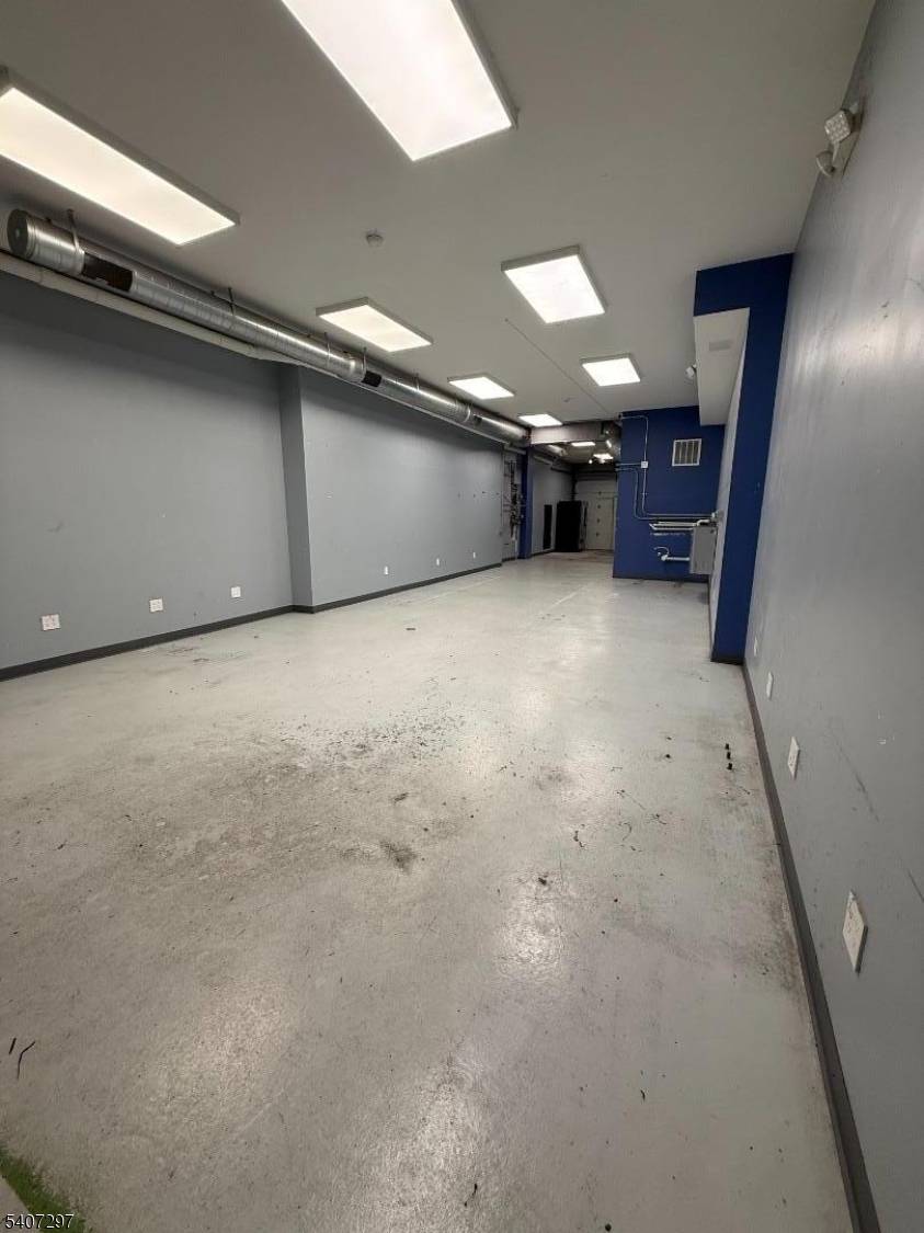 Mixed use building. First floor zoned light industrial.