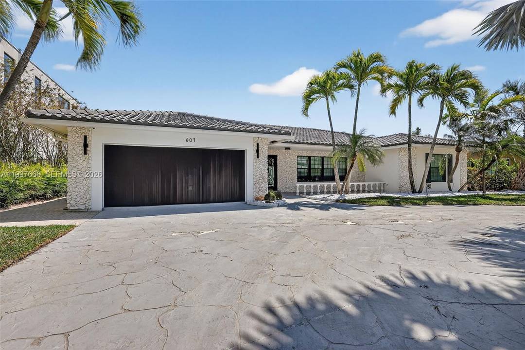Stunning 5 bedroom 4 bathroom home located in the desirable Golden Isles waterfront community, featuring 84 feet of private dockage on a wide canal with ocean access and no fixed ...