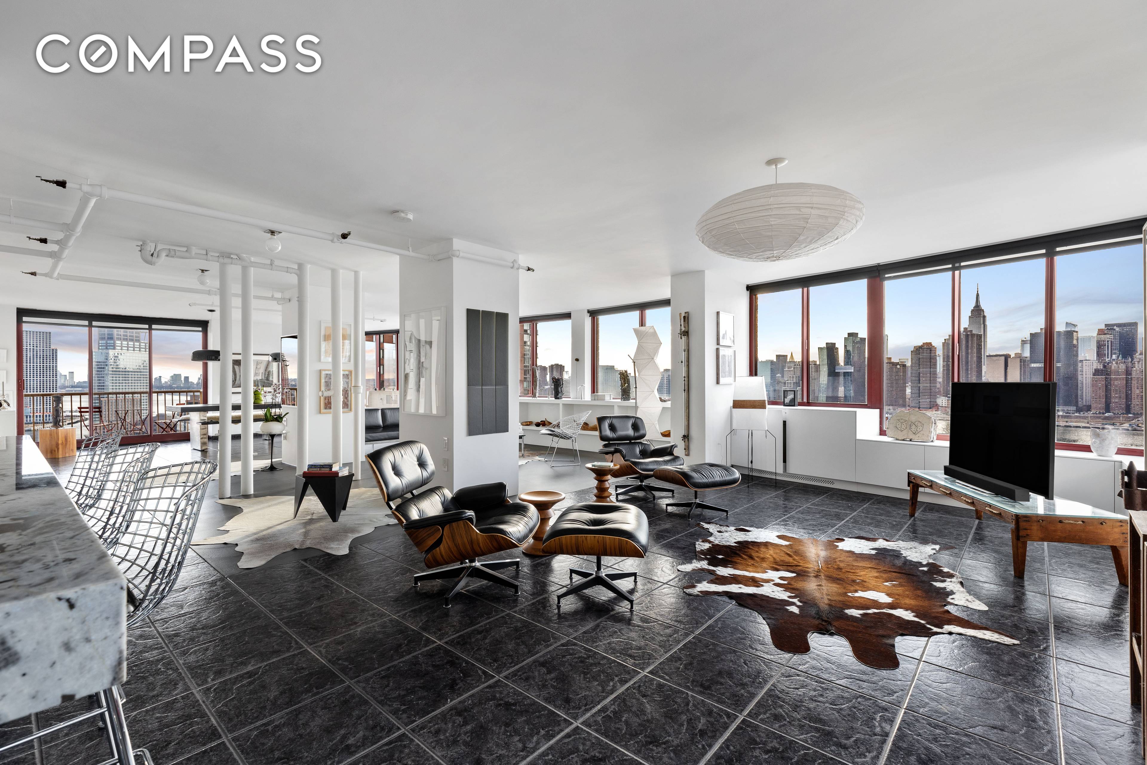 This sprawling 2, 200 SF split 3 bedroom, 2 bathroom aerie offers some of the best views of Manhattan overlooking Gantry State Park.