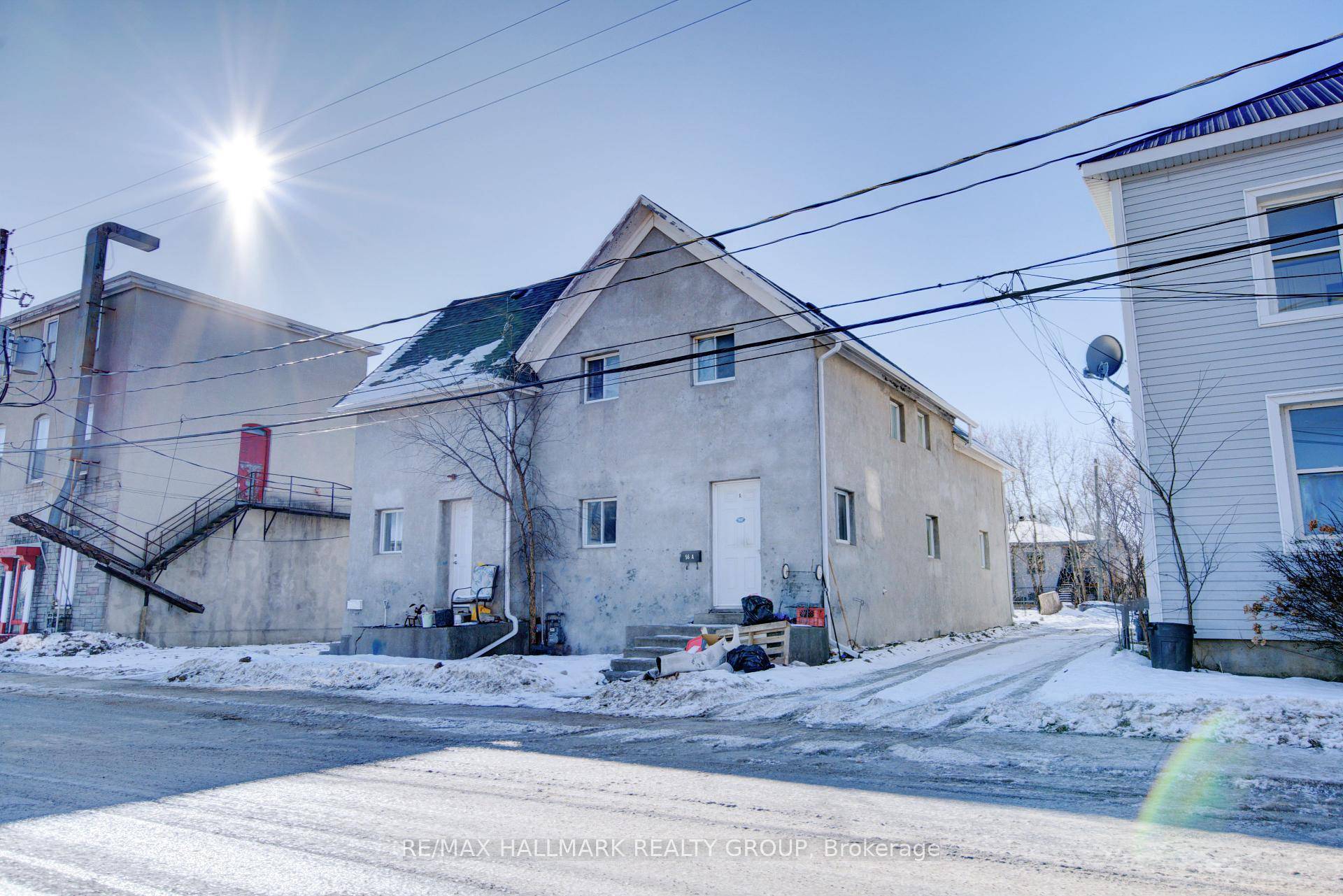 High Yield Fourplex Investment in Prime Smiths Falls LocationInvest in this affordable fourplex in the heart of Smiths Falls, ideally situated right in front of the train station, a prime ...