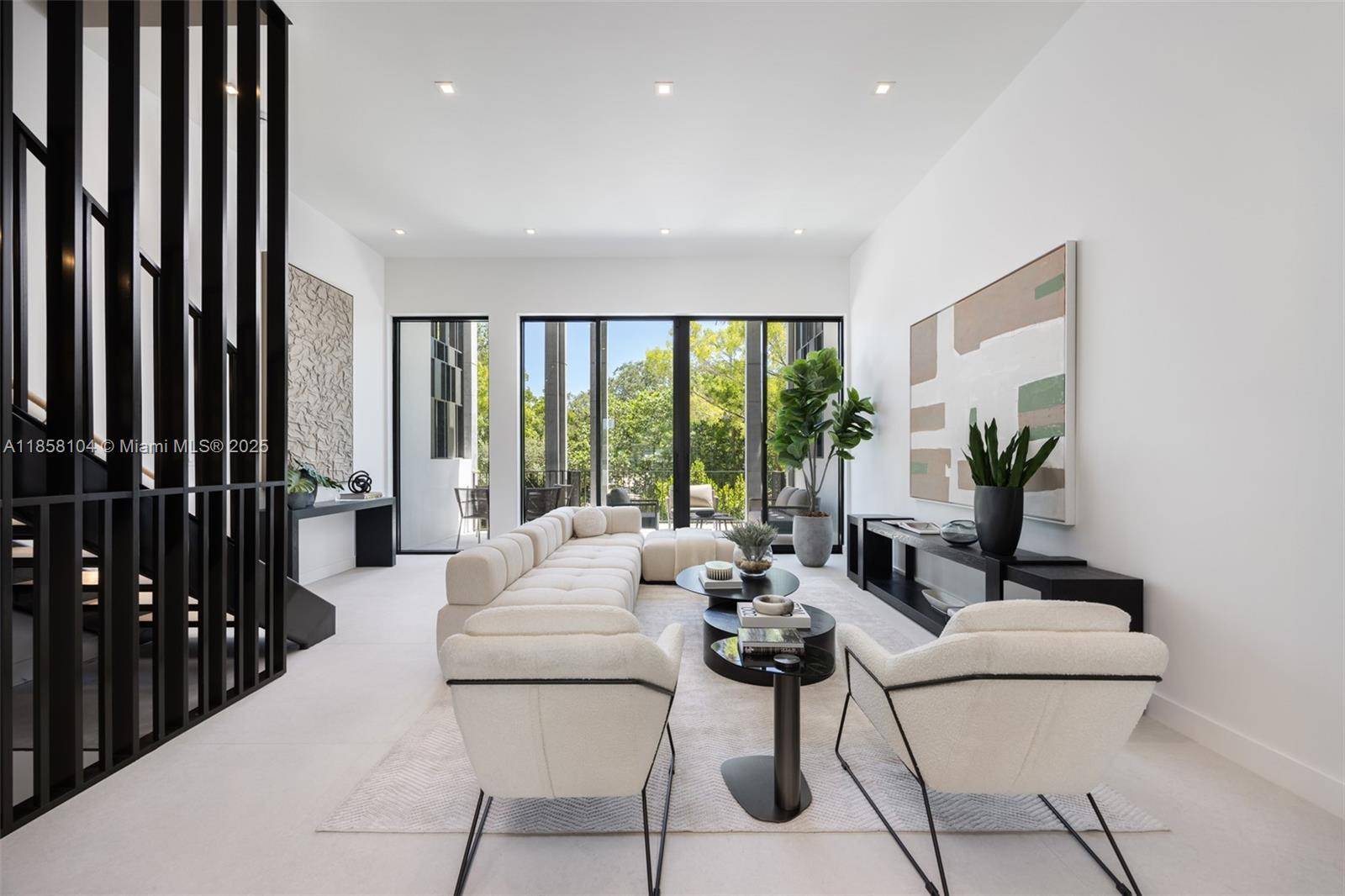 Award winning contemporary residence in The Roads Townhomes featuring a distinctive formed concrete fac ade.