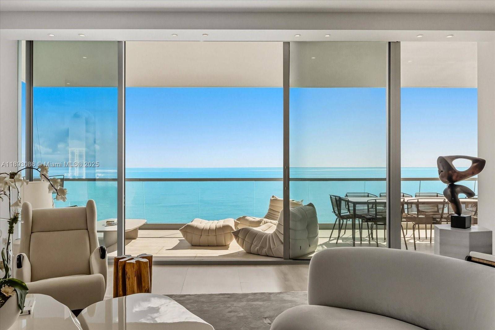 Experience the pinnacle of luxury living in this spectacular oceanfront corner residence at Turnberry Ocean Club.