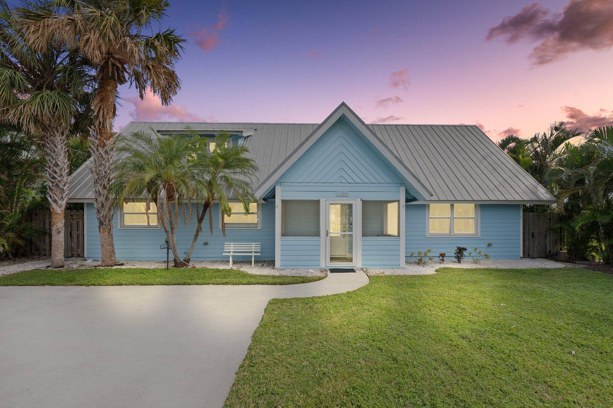 NEW PRICE FOR PARADISE ! Stunning is the word for this beautiful 4 2 pool island home !