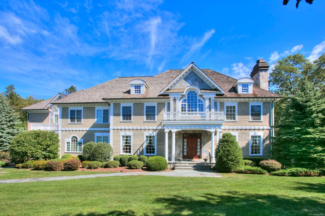 Modern elegance meets estate living at 88 Merry Meet Circle, set on 3 manicured acres in Fairfield's premier gated community, The Ridge.