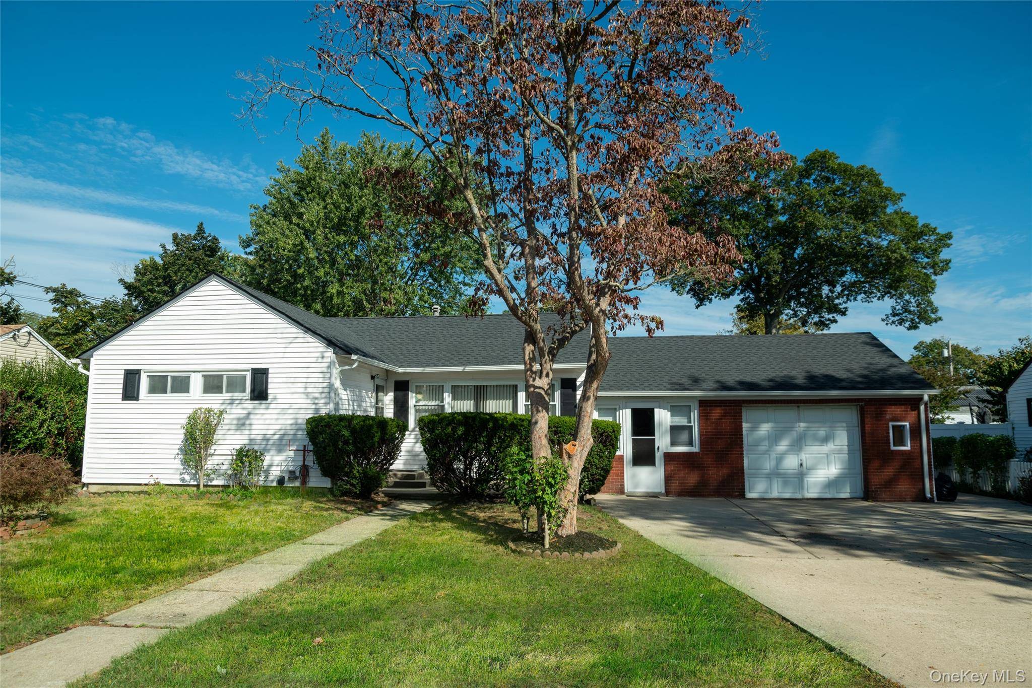 Welcome to this beautifully updated Ranch in the heart of Central Islip !