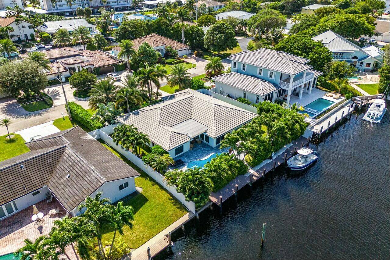 Stunning 4 bedroom, 2. 5 bath deepwater home in the highly sought after Tropic Isle waterfront community.