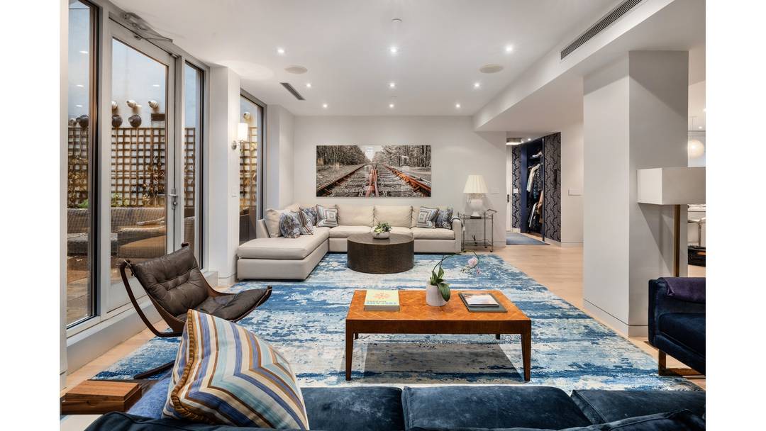 Exceptional Indoor Outdoor Residence in a Full Service Boutique Building Experience townhouse style living with the ease and refinement of a full service luxury building.