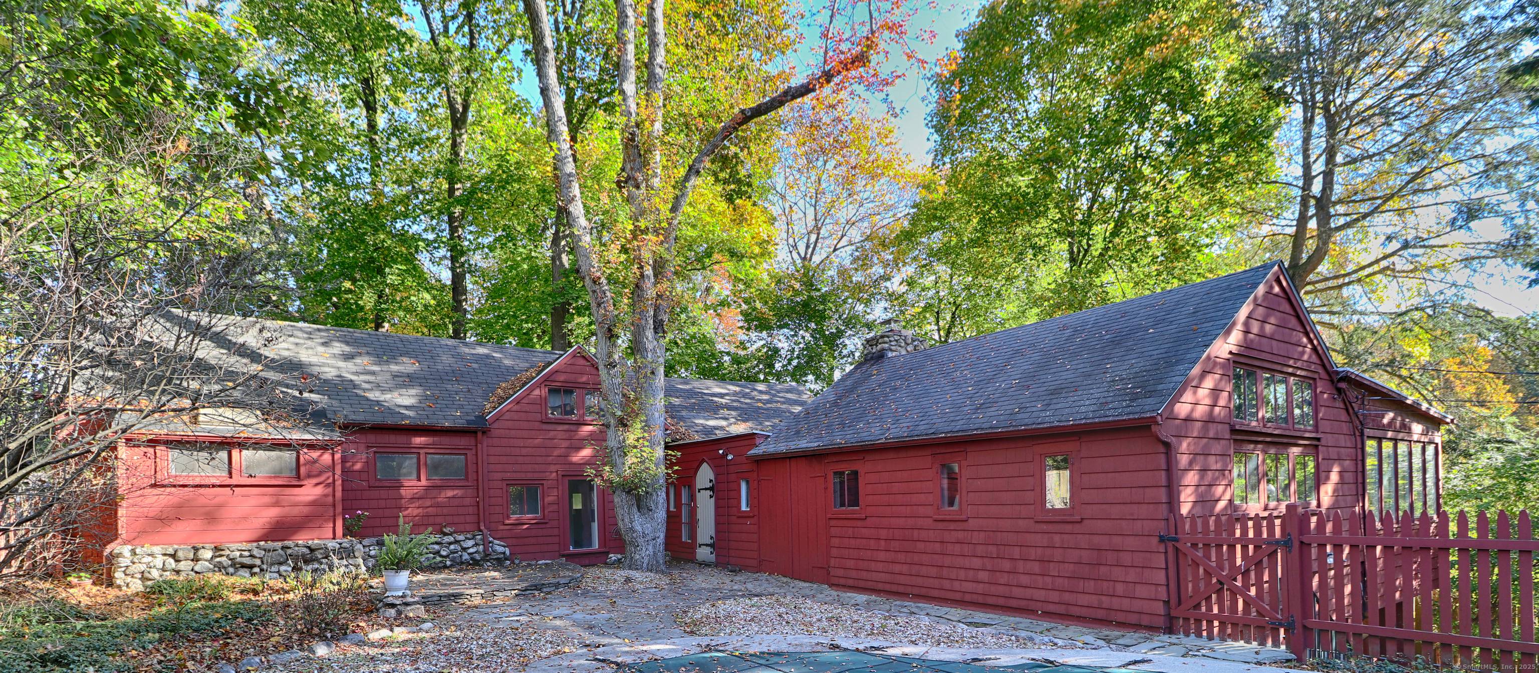 Nestled back on a. 31 Acre site is an intriguing circa 1900 converted barn carriage house.