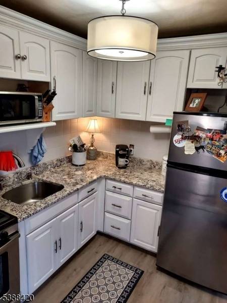 Welcome to this well appointed private home nestled in the heart of Boonton, just steps away from John Hill School and Boonton High School.