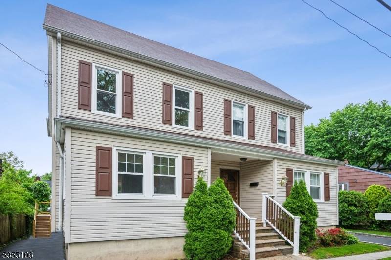 This house has just been totally renovated new floors, moldings, windows, kitchen, baths, appliances including new washer and dryer, lighting, furnace and hot water heater.