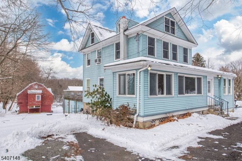 Step into this vintage Colonial at 573 Wyckoff Avenue, set on 1.