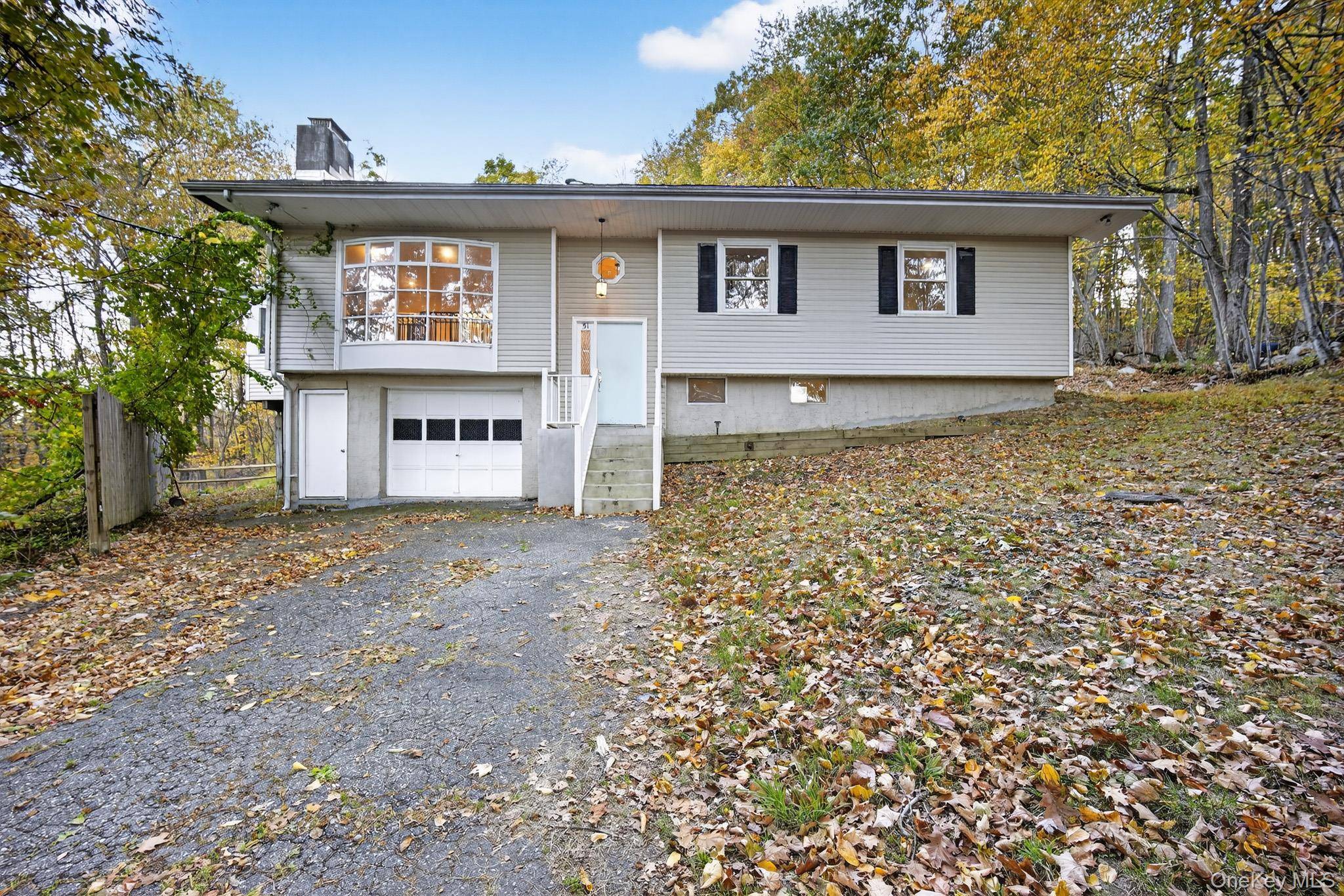 Experience tranquil Kent living with breathtaking mountain views from an expansive, well appointed deck.