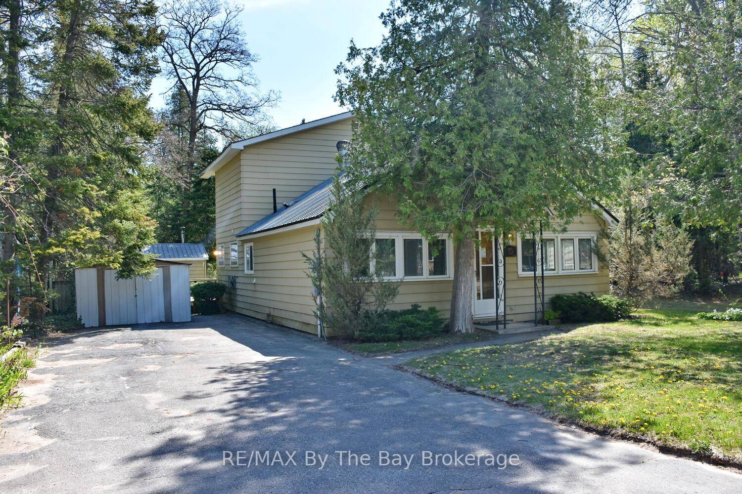 Attention Investors or SMART BUYERS here's a wonderful property literally steps to Georgian Bay on a huge severable lot which includes Lot 64 and Lot 65 99ft x 220ft with ...