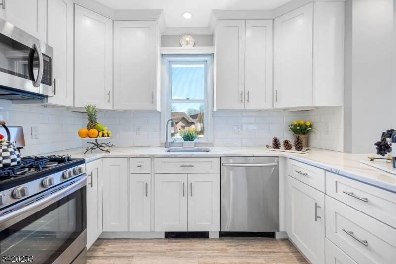Presenting 1130 Abbott Blvd, located on one of Fort Lee's most desirable streets just minutes from the George Washington Bridge ideal for NYC commuters.