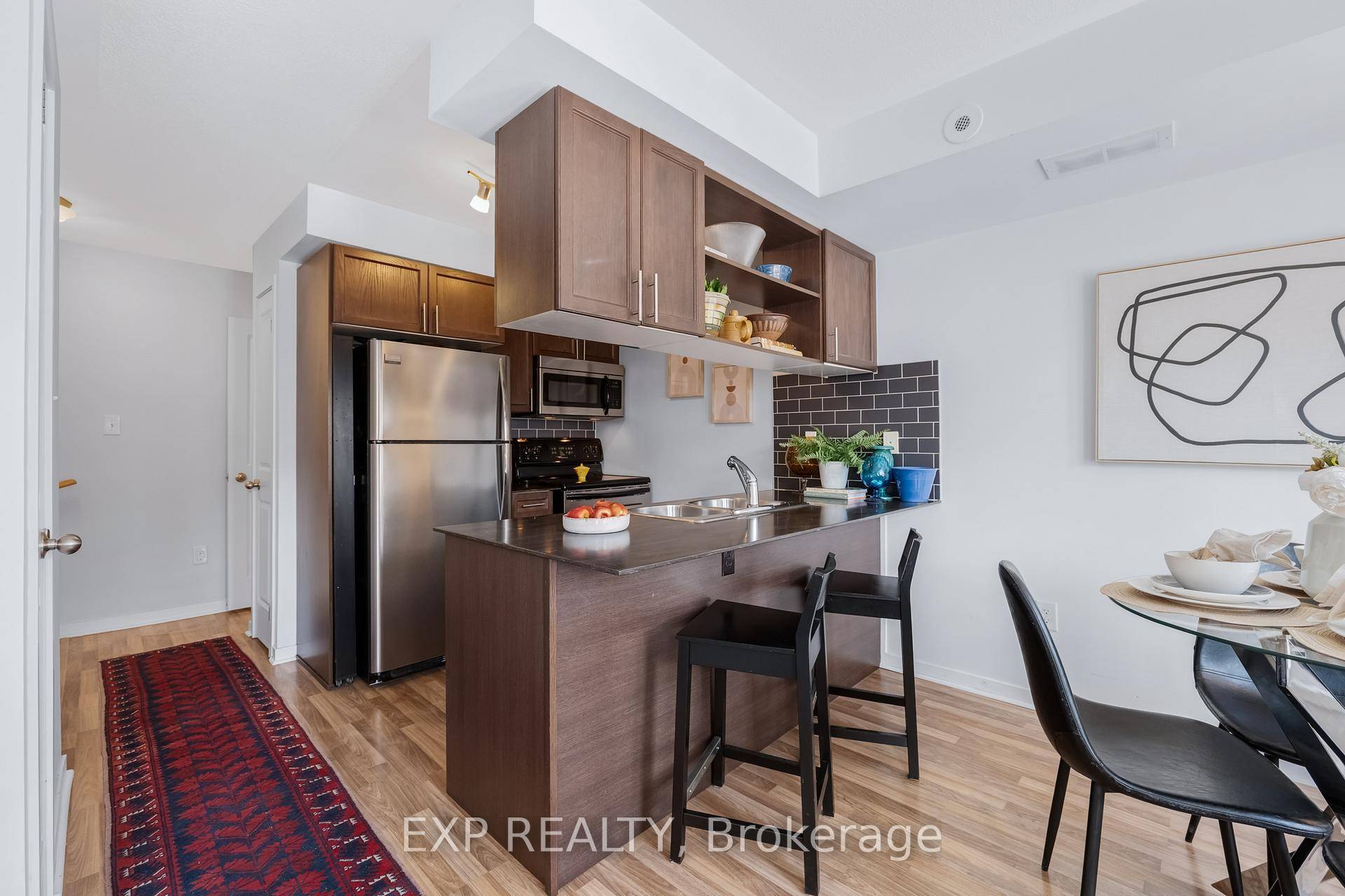 Welcome to 88 Munro Street a stunning stacked townhouse nestled in the heart of prime Riverdale.