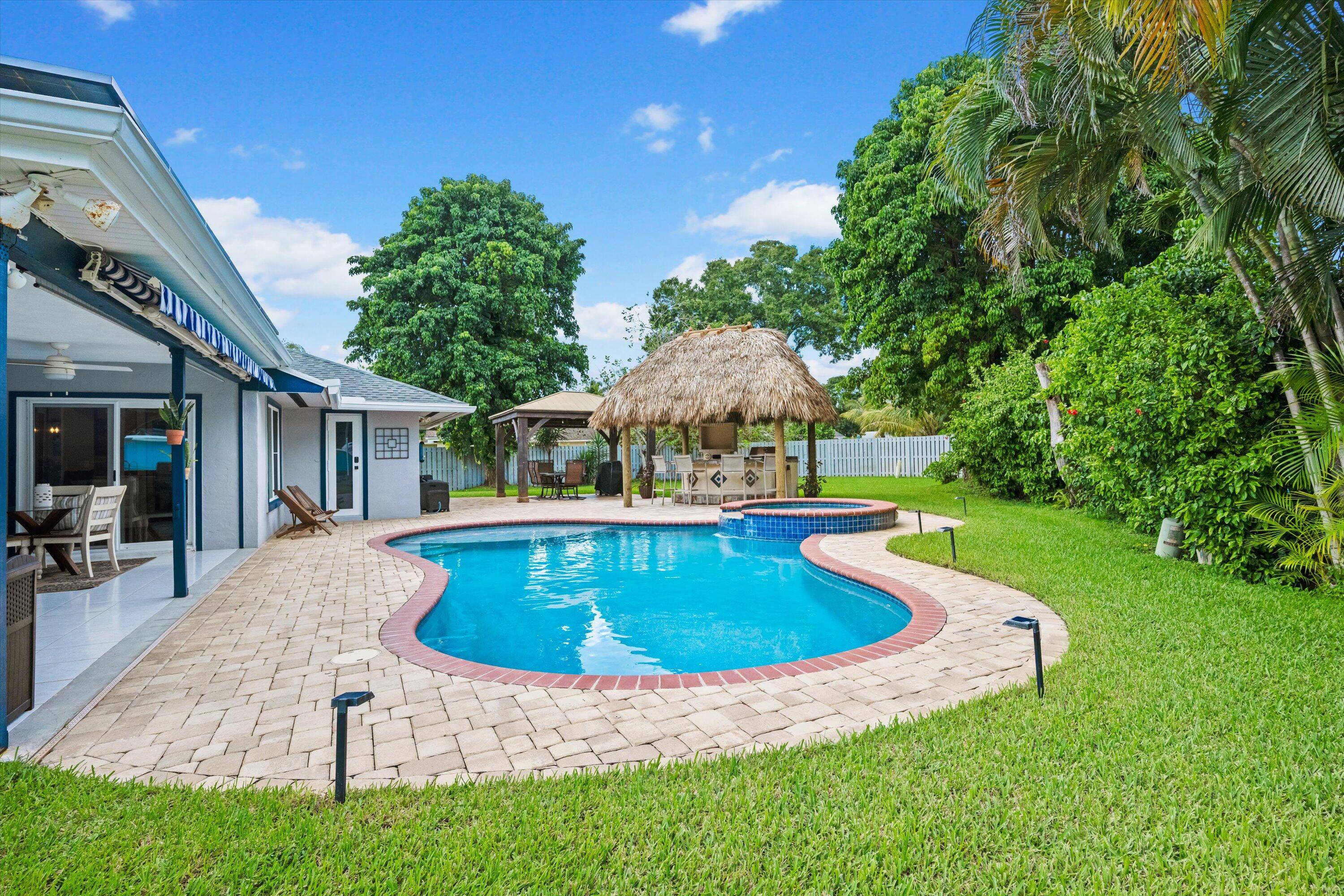 Enjoy the best of Wellington living in this beautifully updated 3 bedroom, 2 bath home located just 12 minutes from the Wellington International show grounds.