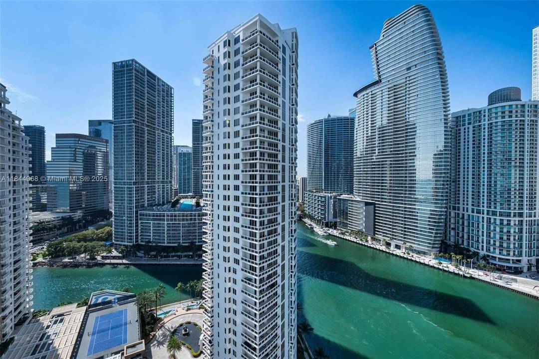 Move in ready residence on prestigious Brickell Key offering stunning bay and city views.