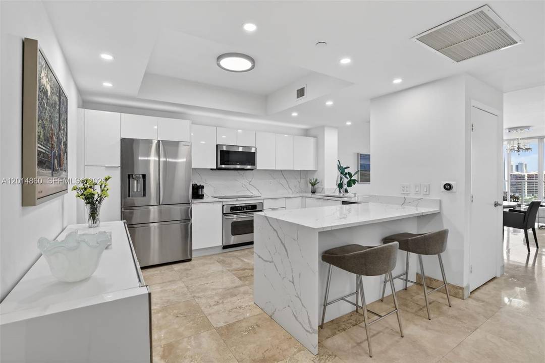 WOW ! ENTER THIS AMAZING RENOVATED RESIDENCE AND IMMEDIATELY amp ; THROUGHOUT SEE THE BEST VIEWS.