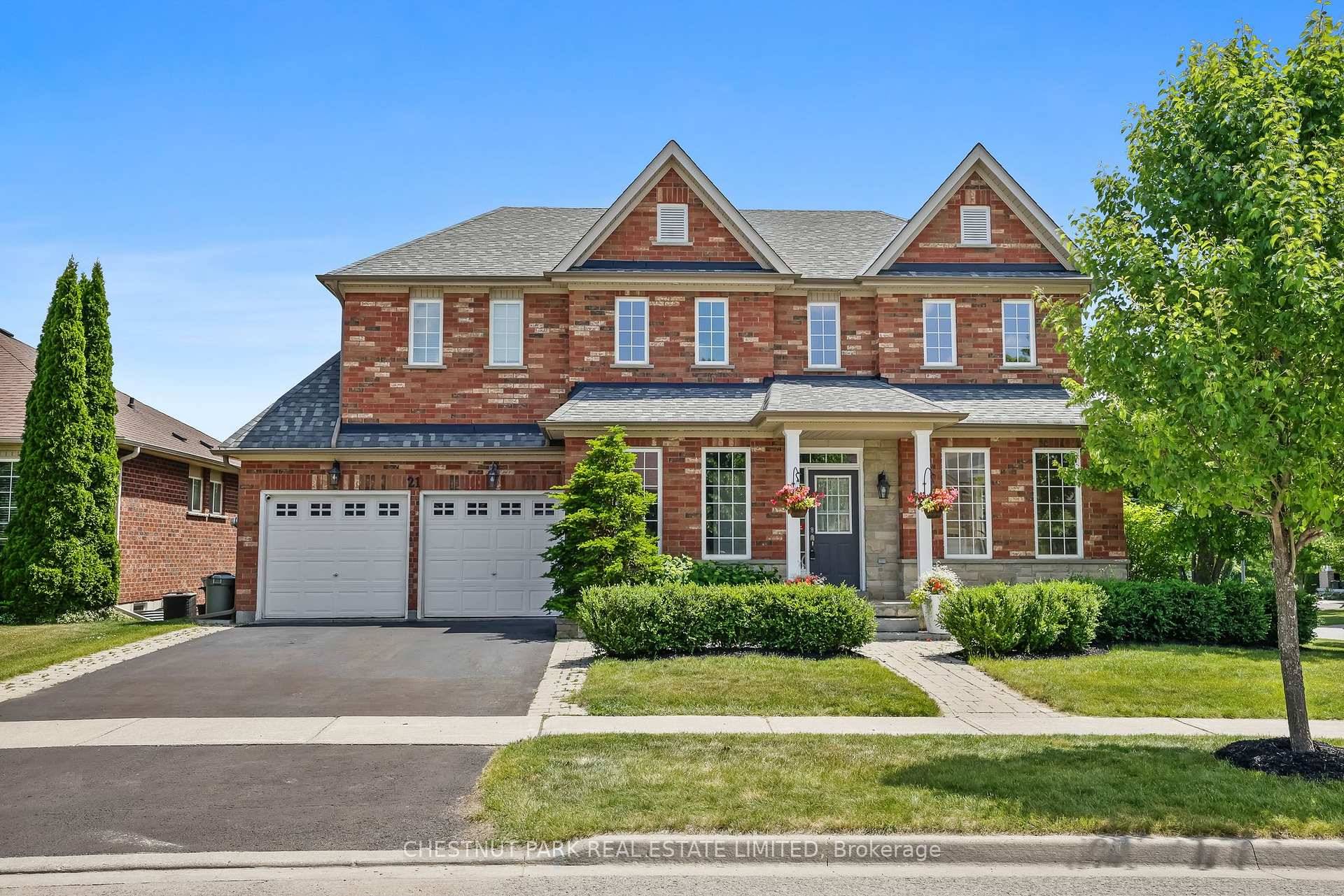 Exceptional 3000 square foot, 4 bedroom, 4 bathroom family home on highly coveted street backing onto protected greenspace !