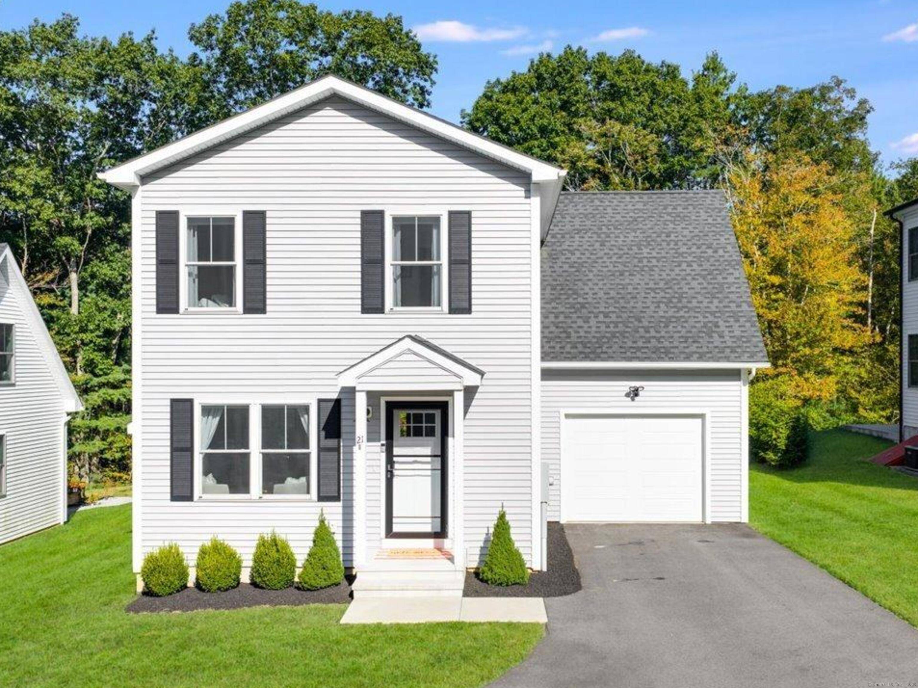 Stunning 2022 built home in the desirable Jordan Woods neighborhood, perfectly positioned on a quiet cul de sac with serene wooded backyard views.