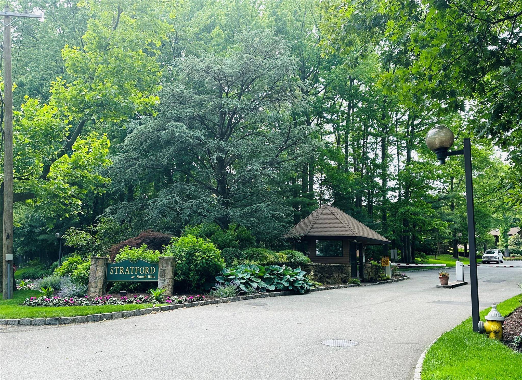 Discover refined living in this desirable corner townhouse at 12 Yale Drive, situated within the prestigious Stratford community of North Hills.