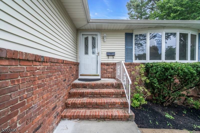 Step into this beautifully refreshed ranch, where warmth and comfort shine through every detail.