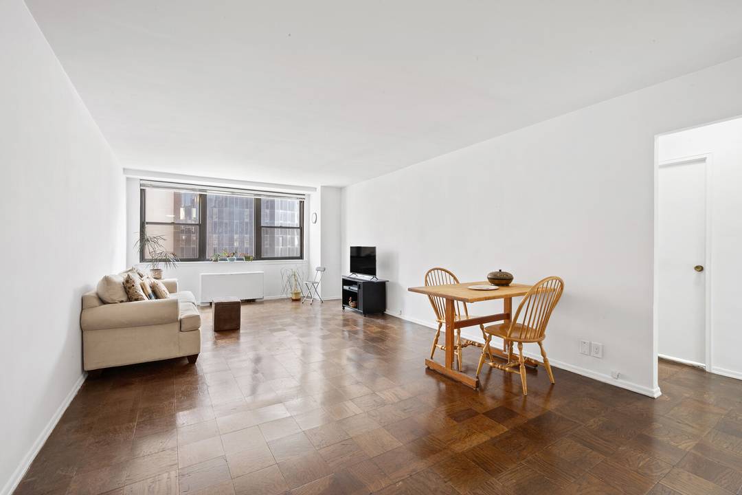 Welcome home to this corner, oversized one bedroom with open city views.