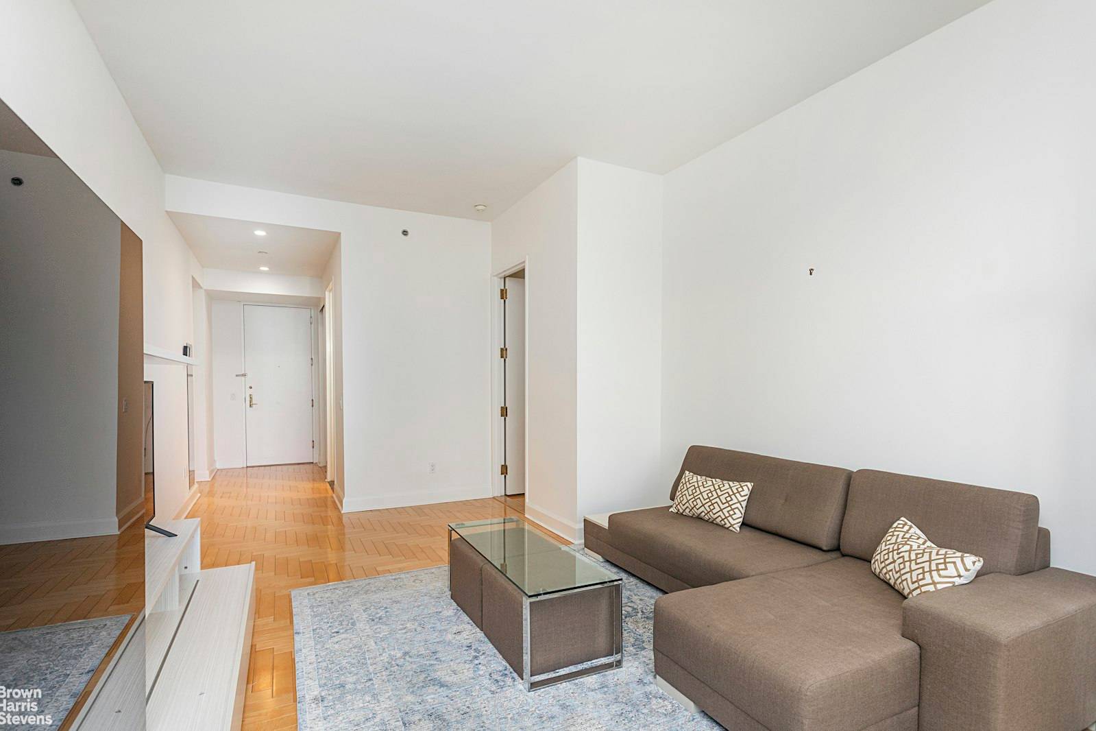Fully furnished and luxurious one bedroom, one and a half bath apartment at the Trump World Tower with unobstructed views of the East River and the United Nations.