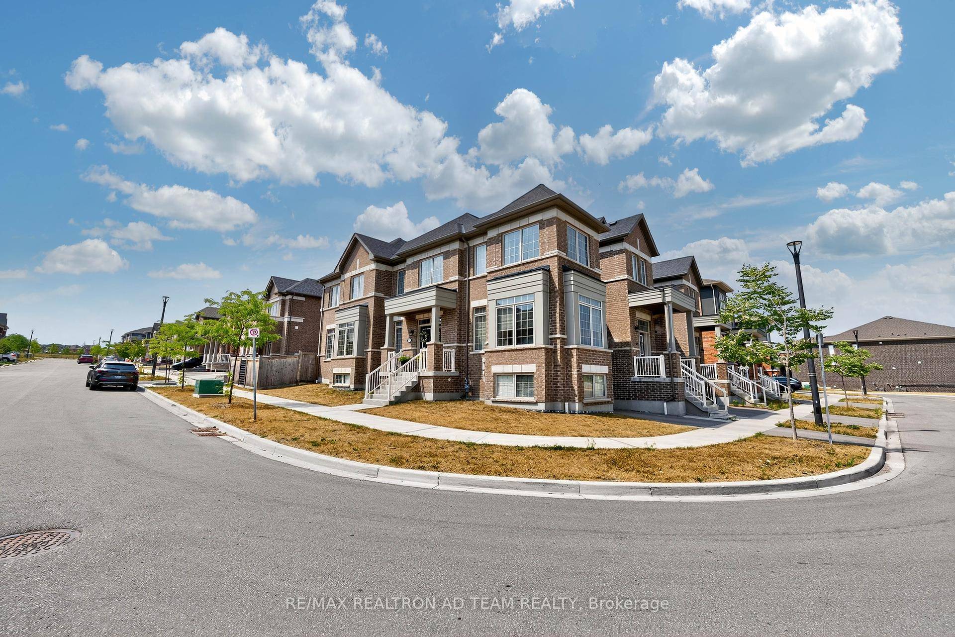 Spacious amp ; Bright End Unit Freehold Townhome Situated on a Premium Corner Lot with No Homes in Front !