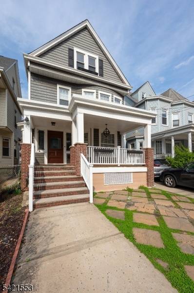 Charming 4 bedroom single family home with backyard and 3 car parking in Jersey City's McGinley Square, offering a suburban style feel without sacrificing easy access to NYC.